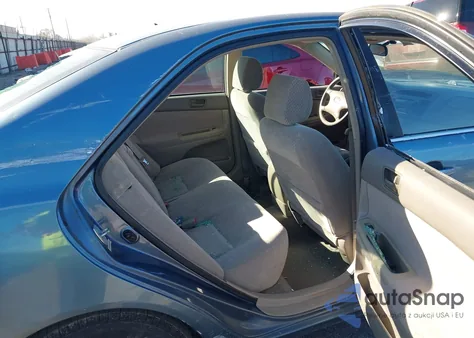 2003 Toyota Camry Le z USA, uszkodzony, nr VIN 4T1BE30K93U641685